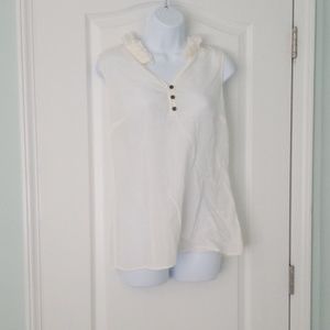 Sleeveless button up blouse with ruffled collar
